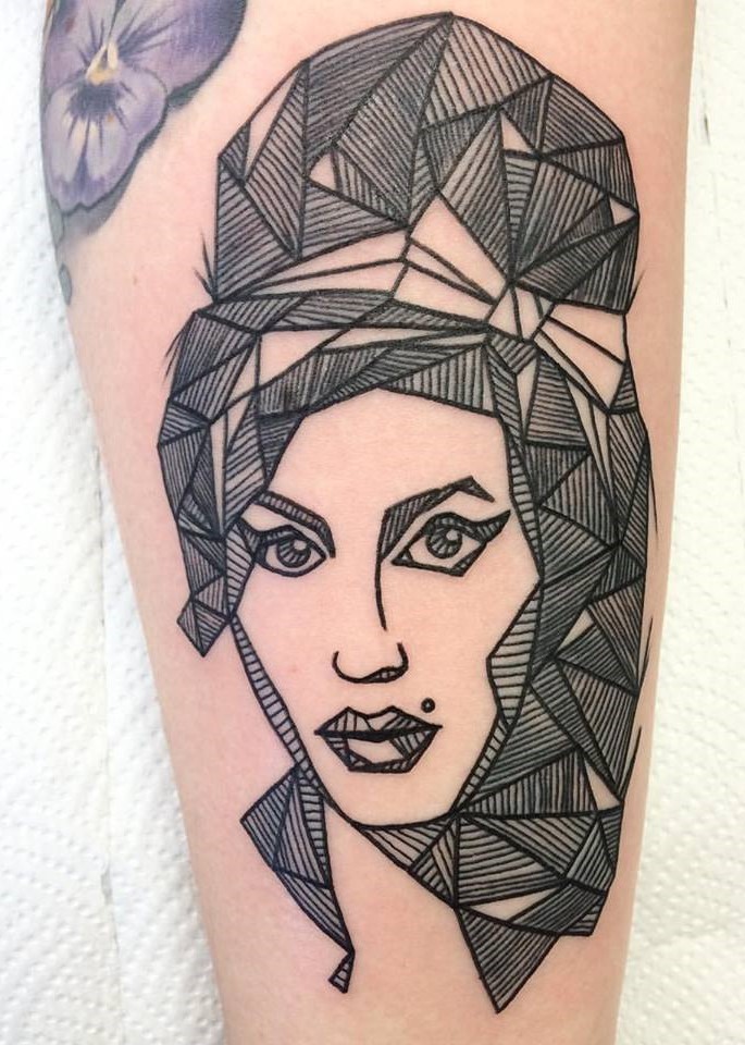 Amy Winehouse black ink tattoo