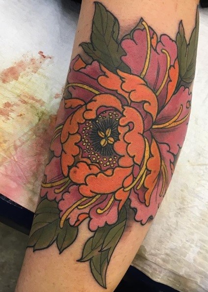 Flower coloured tattoo