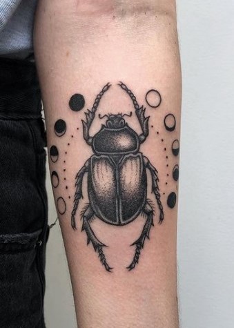 Bettle black ink  tattoo